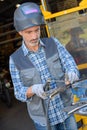 Worker using welding iron Royalty Free Stock Photo