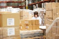 Worker In Warehouse Preparing Goods For Dispatch Royalty Free Stock Photo