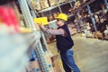 Worker In Warehouse Preparing Goods For Dispatch Royalty Free Stock Photo