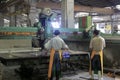 Worker wash the stone processing machine Royalty Free Stock Photo