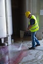 Worker washing industrial site Royalty Free Stock Photo