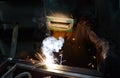 Worker-welder welds metal Royalty Free Stock Photo