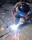 Worker welding on the pabric