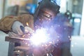 worker welding with sparks all around Royalty Free Stock Photo