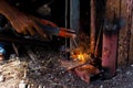 Worker are welding of steel.