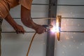 Worker welding steel bar. Royalty Free Stock Photo