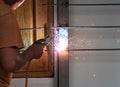 Worker welding steel bar. Royalty Free Stock Photo