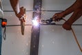 Worker welding steel bar. Royalty Free Stock Photo