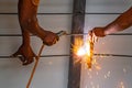 Worker welding steel bar. Royalty Free Stock Photo