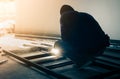 worker welding steel in dark room Royalty Free Stock Photo