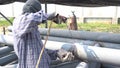 Worker welding structor at the construction site.