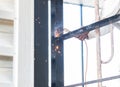Worker welding structure at hight Royalty Free Stock Photo