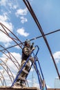 A worker welds metal to the canopy. Technologies