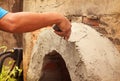 Worker were plastering with trowel putty knife on construction site Royalty Free Stock Photo