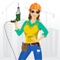 Worker woman with drill