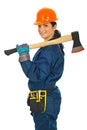 Worker woman holding axe Royalty Free Stock Photo