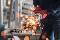 Worker working with a circular grinder