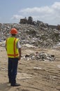 Worker Working At Landfill Site Royalty Free Stock Photo