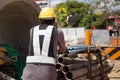 Worker working on PVC pipe line in construction site Royalty Free Stock Photo