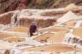 Worker working in the salt marshes of Cusco in Peru