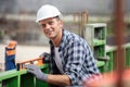 worker working with spirit level at construction site Royalty Free Stock Photo