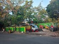 workers arrange garbage at the garbage collection point