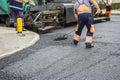 Workers on Asphalting road