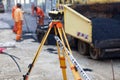 Workers asphalting the street