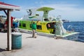 Workers of the `Belize water taxi` having fun at the harbor of Belize City Royalty Free Stock Photo