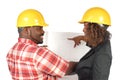 Workers with blueprints Royalty Free Stock Photo