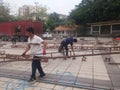 Shenzhen, China: workers build shelves for a stage show