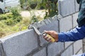 Workers build a wall closeup detail work Royalty Free Stock Photo