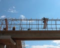 Workers are building a pedestrian crossing