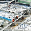 Workers on the building roof Royalty Free Stock Photo