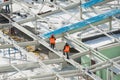 Workers on the building roof Royalty Free Stock Photo