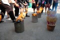 workers burning fake paper money on Chinese New Year