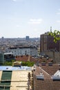 Workers carry out repair work on the roof of the building