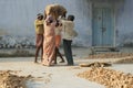 Workers carrying ginger at Market in Cochin, Ind
