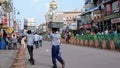 Workers carrying paper teacups on top of their heads at Chandni Chowk Delhi