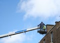 Workers in cherry picker