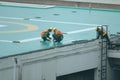 Workers cleaning high-rise buildings are at work in the capital city of Jakarta