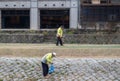 Workers Cleaning Kamo Riverbanks, Kyoto, Japan Royalty Free Stock Photo