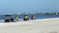 Workers cleaning up dead fish Royalty Free Stock Photo