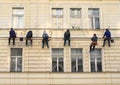 Workers - Climbers cleaning facade and windows