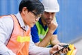 Workers closely monitor Covid breaking news on the phone. People reading and update new information from social media in real time Royalty Free Stock Photo