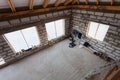 Workers clothes, parts of scaffolding and construction material on the floor during on the remodeling, renovation, extension Royalty Free Stock Photo