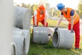 Workers with concrete pipes Royalty Free Stock Photo