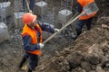 Workers at the construction site clearing debris Royalty Free Stock Photo