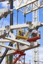 Workers on a construction site. Engineering and architectural infrastructure. Safety