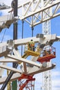 Workers on a construction site. Engineering and architectural infrastructure. Safety